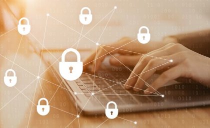 UQ researchers say boards need more cybersecurity skills. Image: Adobe fingers on a keyboard overlaid with padlock icons